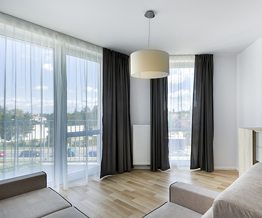 Big windows in modern living room apartment interior design
